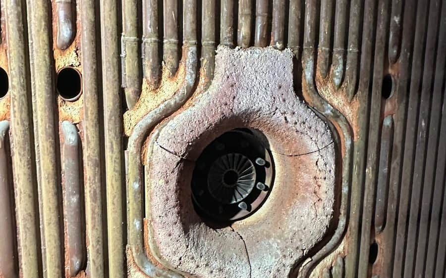 Part of a tube wall with eroded lining and exposed studs