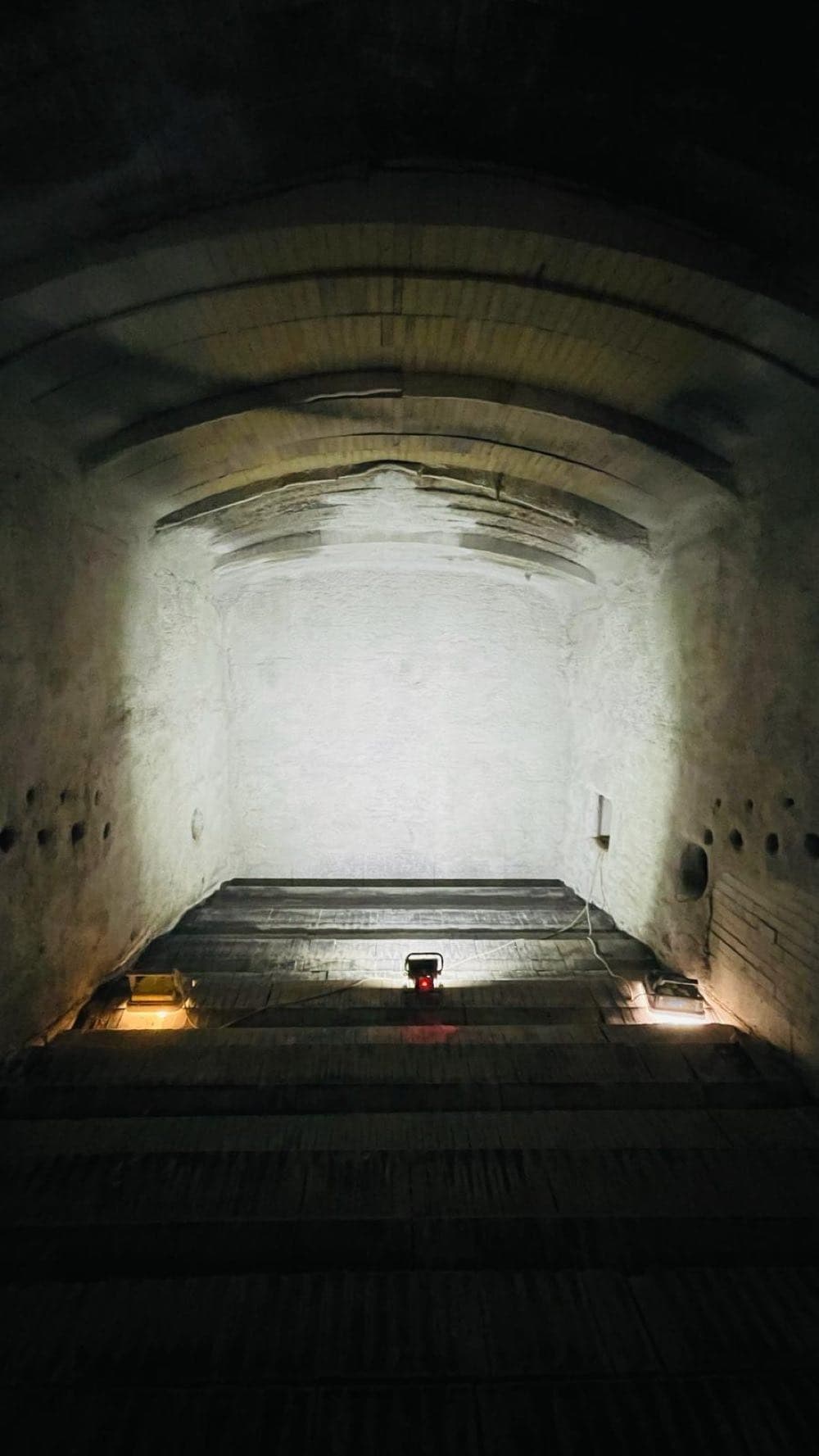 Illuminated combustion chamber of a biomass boiler after completion of the lining